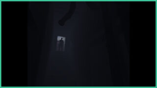 A shadowy figure stands in an open doorway at the top of a set of stairs, with the rest of the room being shrouded in darkness and metal pipes above in Cold City. A shadowy figure stands in an open doorway at the top of a set of stairs, with the rest of the room being shrouded in darkness and metal pipes above in Cold City.