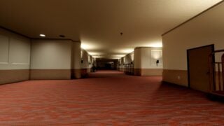 Screenshot from Unseen Liminality from the Hotel area. It shows a deserted hotel corridor, with cream-coloured walls, and a patterned red carpet. The end of the hallway is shrouded in darkness. Screenshot from Unseen Liminality from the Hotel area. It shows a deserted hotel corridor, with cream-coloured walls, and a patterned red carpet. The end of the hallway is shrouded in darkness.