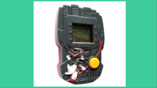 The Shadow Grinder toy from the McDonald's Sonic the Hedgehog LCD Game Consoles series. The Shadow Grinder toy from the McDonald's Sonic the Hedgehog LCD Game Consoles series.